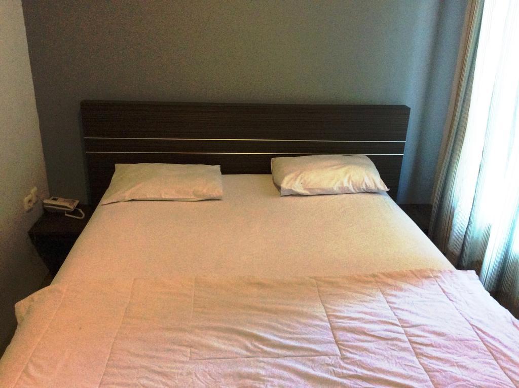 Hotel Diamond Makassar Szoba fotó
